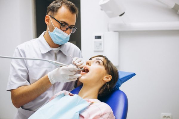 Patient getting a dental cleaning